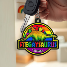 Load image into Gallery viewer, “Let Your Pride Roar!” - Colorful Dinosaur Keychain - Personalized Gift for LGBTQ+ Friends, Family and Allies Keychains PopCulturePrints