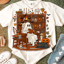Load image into Gallery viewer, "Read Between the Spooks: Cozy Ghost in Library Tee" - Personalized Gift for Book Lovers & Halloween Enthusiasts Shirts PopCulturePrints