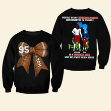 Load image into Gallery viewer, “Behind Every Football Player is a Supports Mom” - Personalized Football Mom Shirt - Perfect Gift for Moms, Grandmas & Sports Enthusiasts Shirts PopCulturePrints
