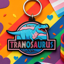 Load image into Gallery viewer, “Let Your Pride Roar!” - Colorful Dinosaur Keychain - Personalized Gift for LGBTQ+ Friends, Family and Allies Keychains PopCulturePrints