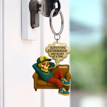 Load image into Gallery viewer, “Surviving Fatherhood One Blunt at a Time” - Personalized Keychain Gift for Dad, Grandpa &amp; New Dads Keychains PopCulturePrints
