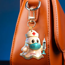 Load image into Gallery viewer, Nurse Ghost Keychain - A Heartfelt Tribute to Caregivers Keychains PopCulturePrints
