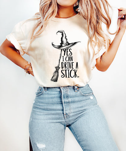 Yes I Can Drive a Stick - Funny Witch Shirt - Customizable Gift for Girlfriend, Wife, or Halloween Enthusiasts Shirts PopCulturePrints