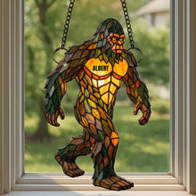 Load image into Gallery viewer, “Embrace the Myth of Bigfoot” - Personalized Bigfoot Suncatcher Ornament - Gift for Bigfoot Lovers, Nature Enthusiasts, and Unique Home Decor Seekers Ornament PopCulturePrints
