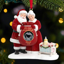 Load image into Gallery viewer, “Here comes your greatest gift” - Santa Claus Custom Photo Pregnancy Christmas Ornament - Personalized Gift for Expecting Parents, Grandparents, and Friends Ornament PopCulturePrints
