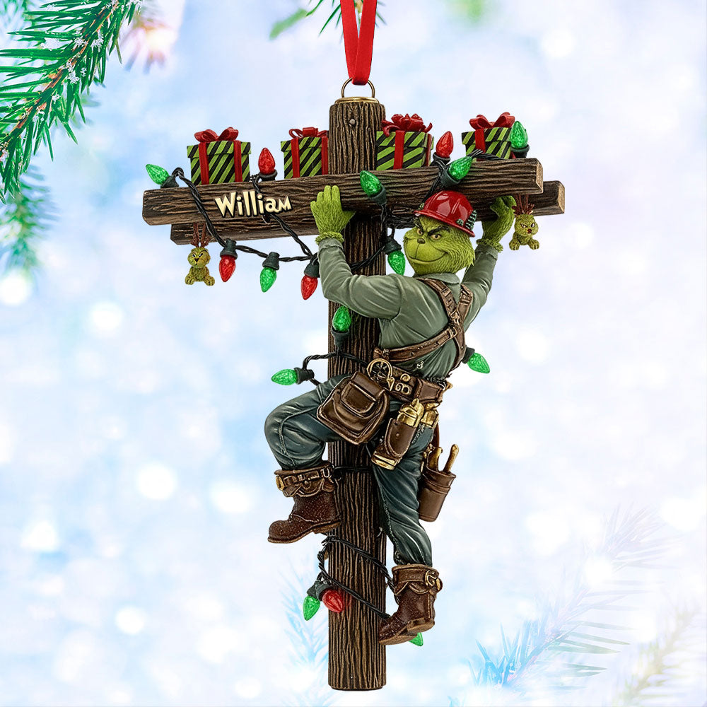 "Light Up the Holidays with a Grinch Twist - Funny Climbing Lineman Wood Ornament - Personalized Gift for Linemen, Electricians, & Gift Givers" Ornament PopCulturePrints