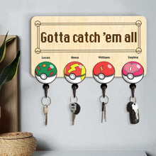 Load image into Gallery viewer, Personalized Family Key Hanger - Catch 'Em All Design Wood Sign PopCulturePrints
