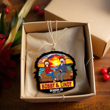 Load image into Gallery viewer, “Celebrate Your Love With Humor” - Quirky Cartoon Couple Ornament - Personalized Gift for Couples Ornament PopCulturePrints
